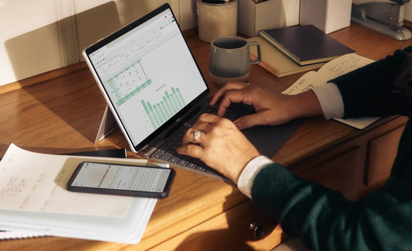 Small business owner using AI on a laptop to save time